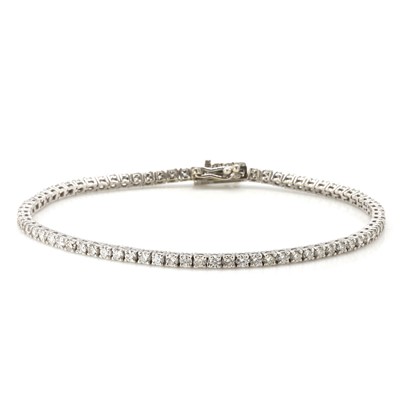 Lot 75 - A white gold diamond line bracelet