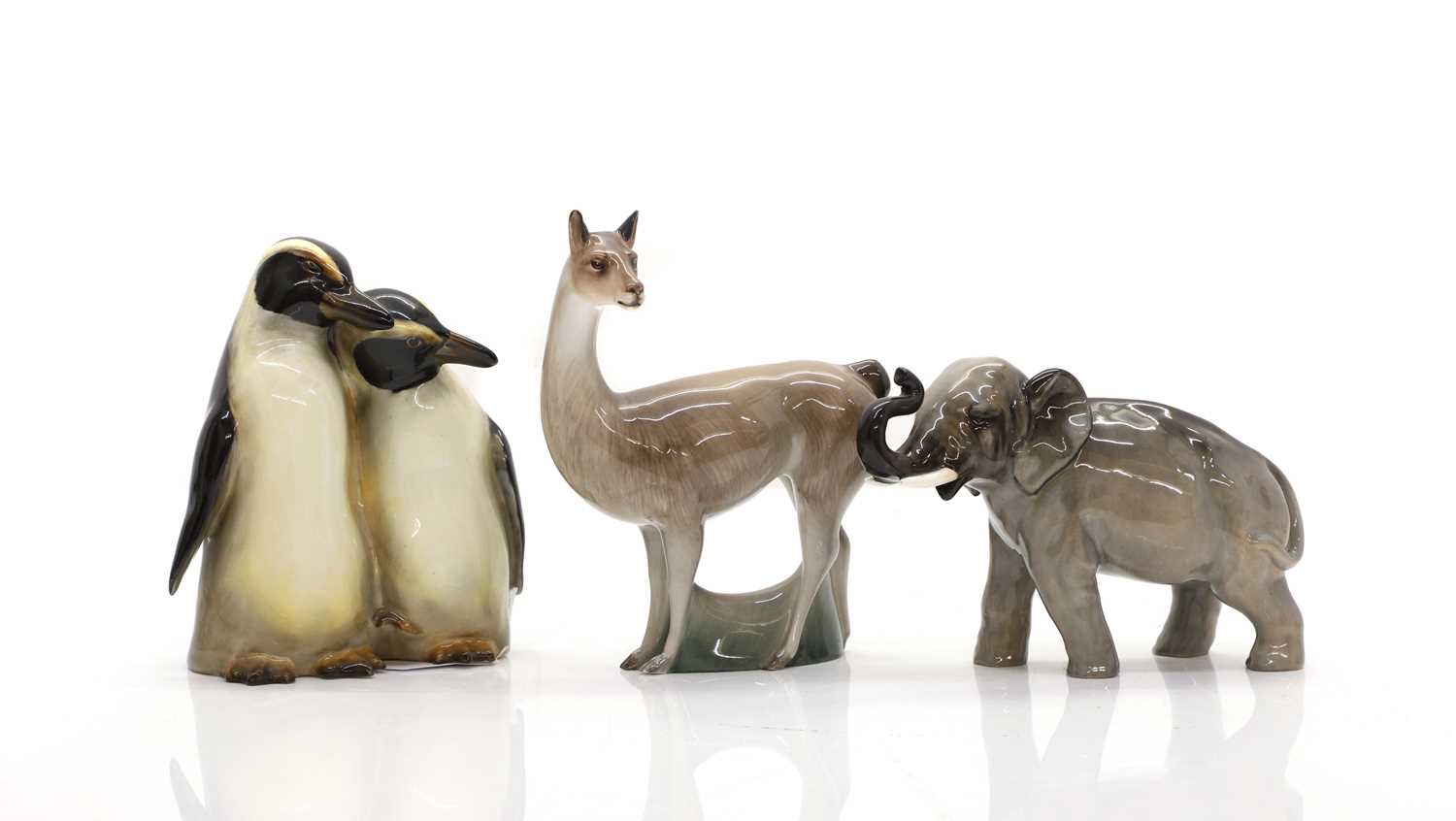 Lot 105 - A group of three Doulton animals