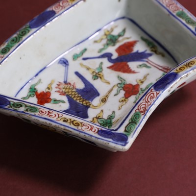 Lot 23 - A Chinese wucai saucer