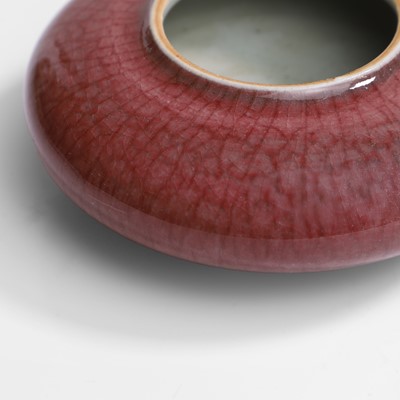 Lot 65 - A Chinese red-glazed brush washer
