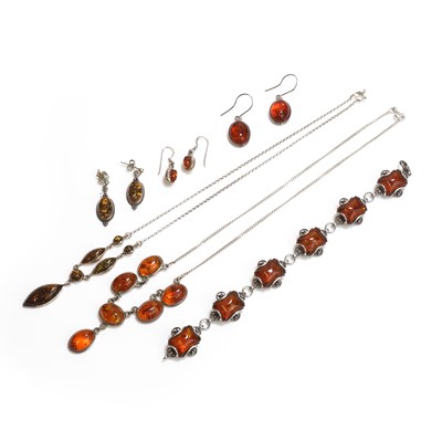 Lot 1233 - A group of amber set jewellery