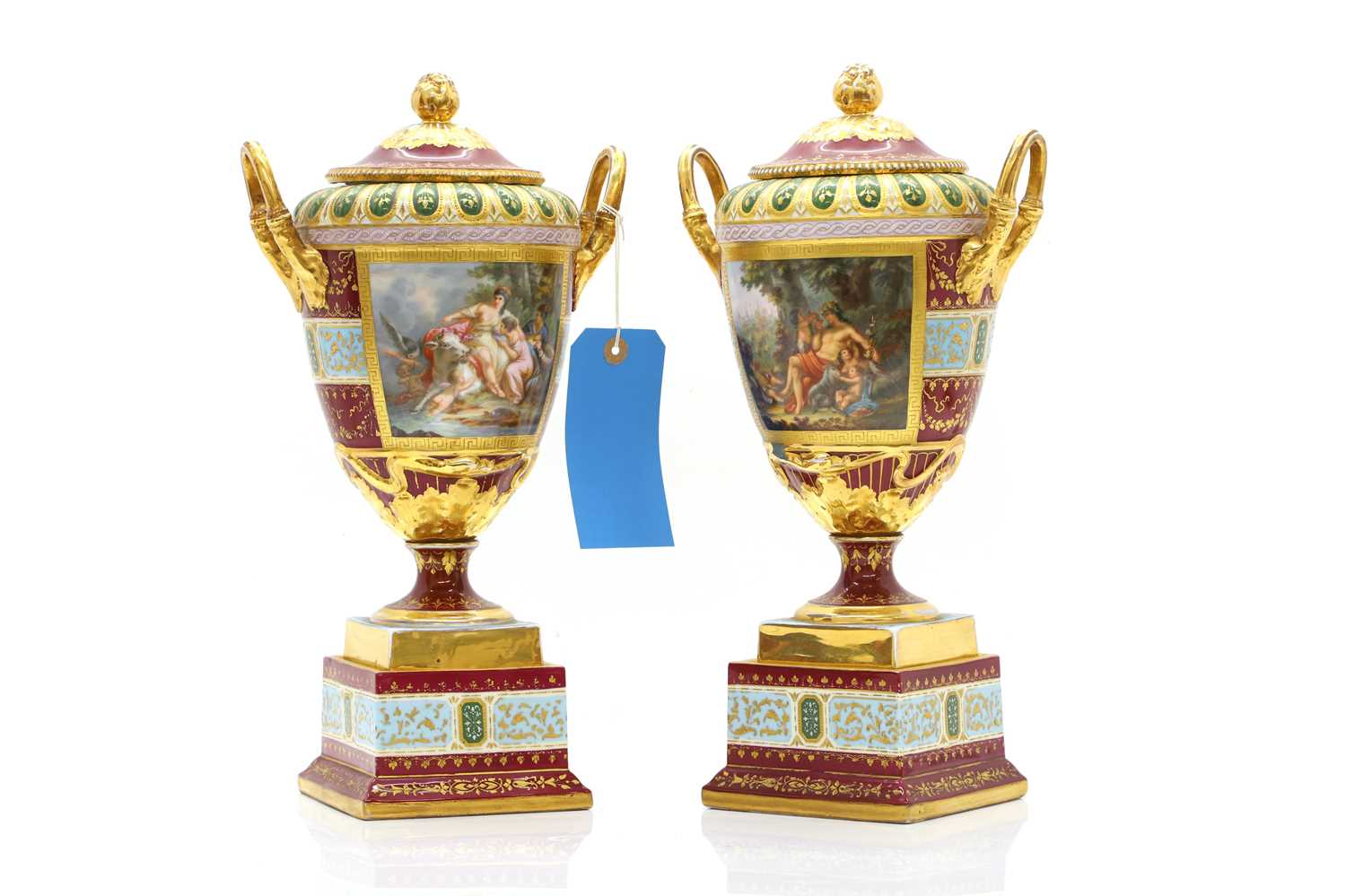 Lot 110 - A large pair of Vienna porcelain urns and covers