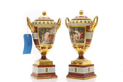 Lot 110 - A large pair of Vienna porcelain urns and covers