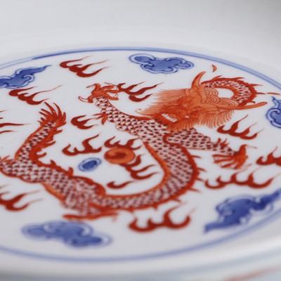 Lot 87 - A Chinese underglaze blue and iron-red decorated plate
