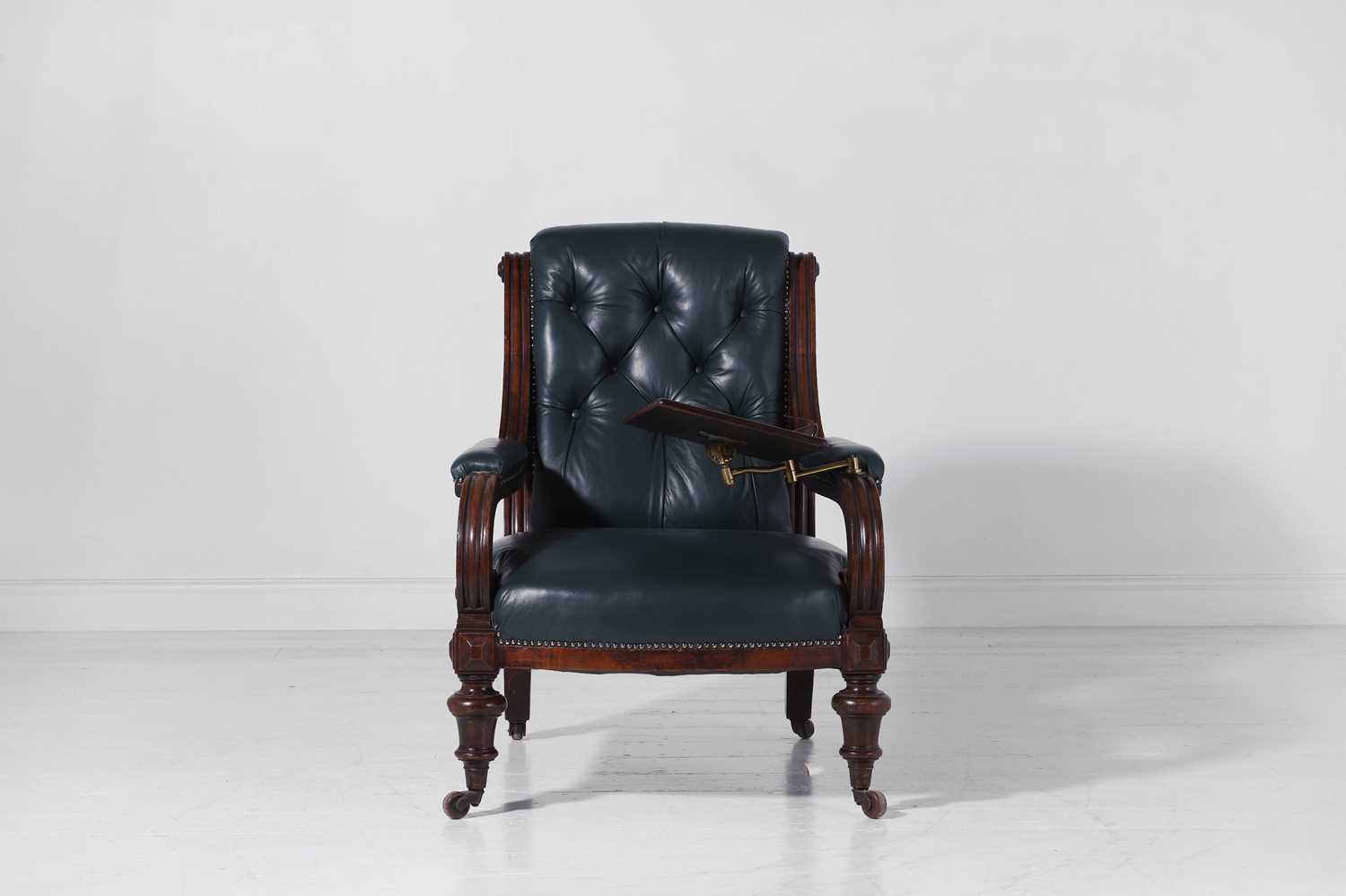 Lot 249 - A Victorian walnut library armchair