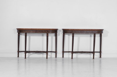 Lot 150 - A pair of George III-style painted wooden console tables