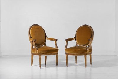 Lot 82 - A pair of Louis XVI-style giltwood fauteuils