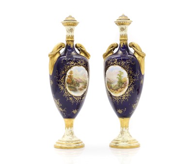 Lot 101 - A pair of Coalport 'Ullswater' twin handle vase and covers