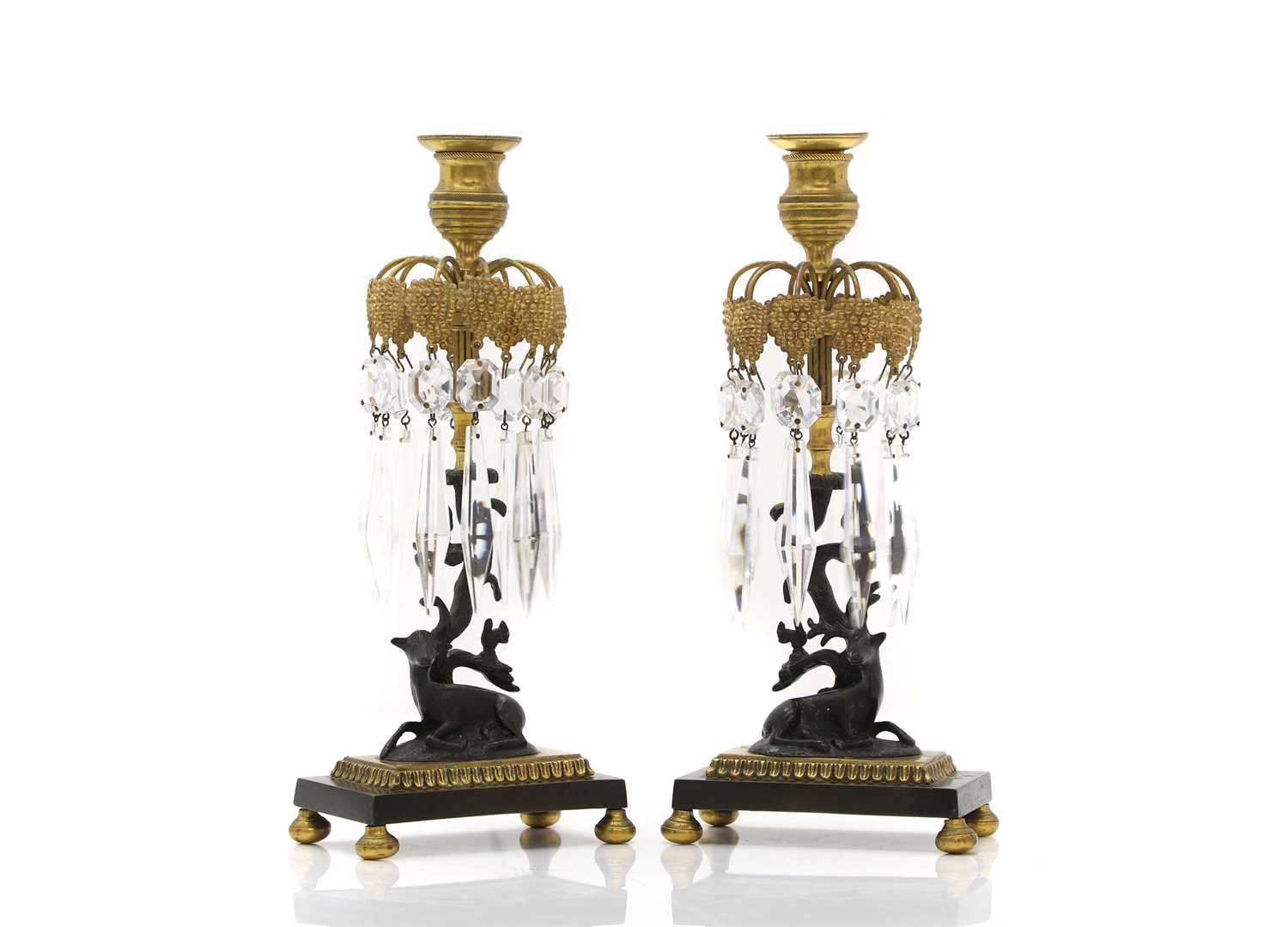 Lot 301 - A pair of Regency style brass and patinated bronze table lustres