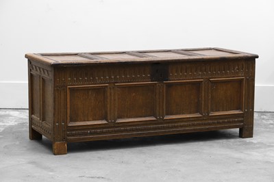 Lot 511 - An oak panelled coffer