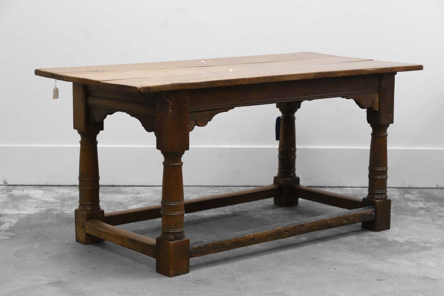Lot 510 - An oak refectory table