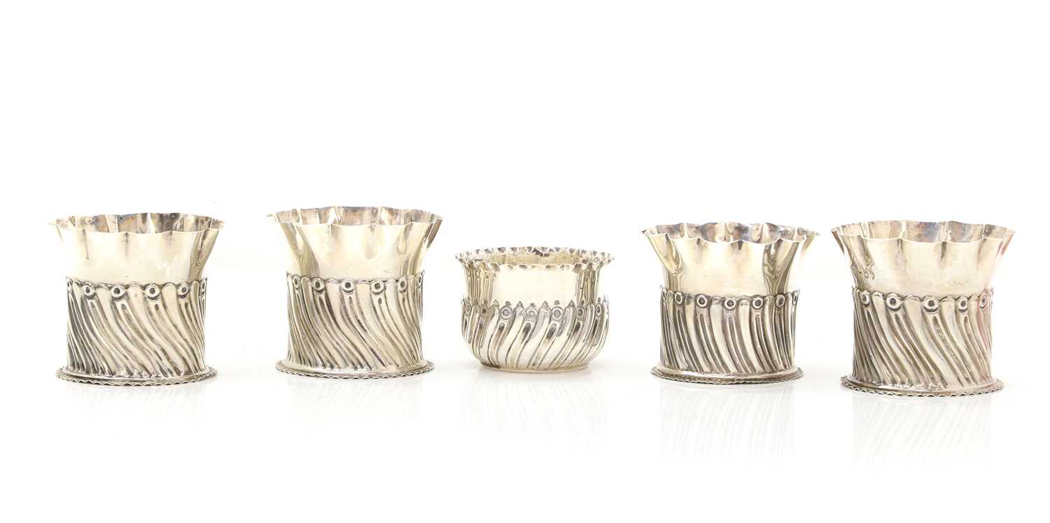 Lot 2 - A set of four silver bottle coasters or holders