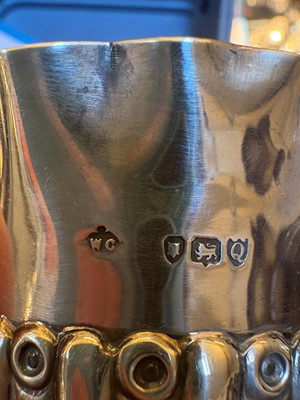 Lot 2 - A set of four silver bottle coasters or holders