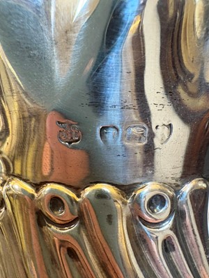 Lot 2 - A set of four silver bottle coasters or holders