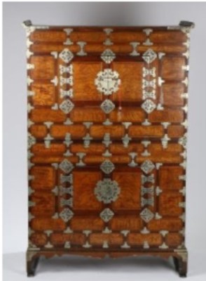 Lot 532 - A Korean elm wood and brass-mounted cabinet or bandaji