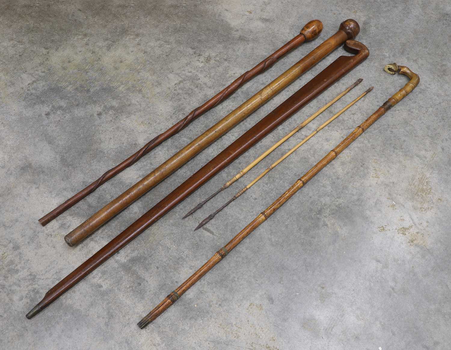 Lot 123 - Three walking sticks and a sword stick