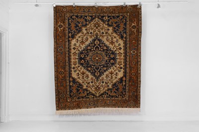 Lot 105 - A Persian Heriz wool rug