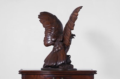 Lot 236 - A Black Forest carved wooden longcase clock