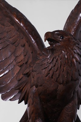 Lot 236 - A Black Forest carved wooden longcase clock