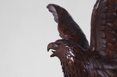 Lot 236 - A Black Forest carved wooden longcase clock