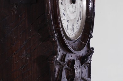 Lot 236 - A Black Forest carved wooden longcase clock