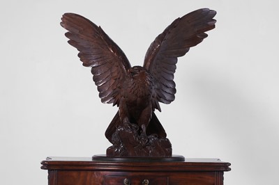 Lot 236 - A Black Forest carved wooden longcase clock