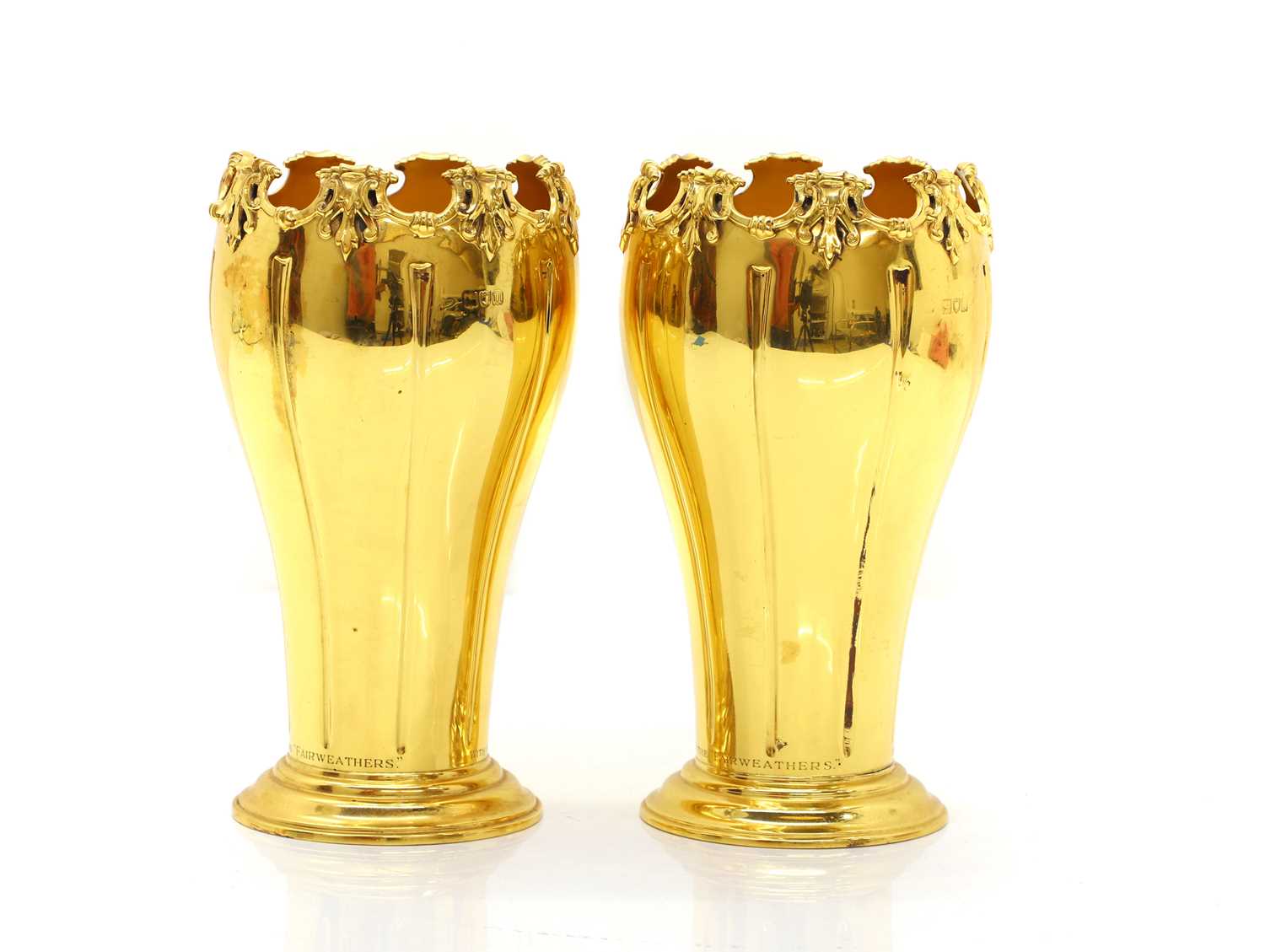 Lot 9 - A pair of silver gilt vases
