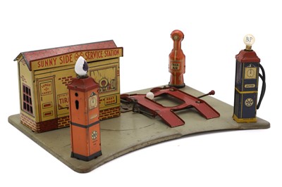 Lot 50 - A 'Sunny Side Service Station' tinplate toy garage with electric illumination by Marx