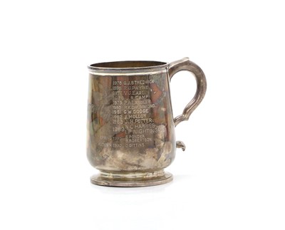 Lot 11 - A silver presentation mug