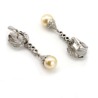 Lot 57 - A pair of cultured pearl and diamond earrings