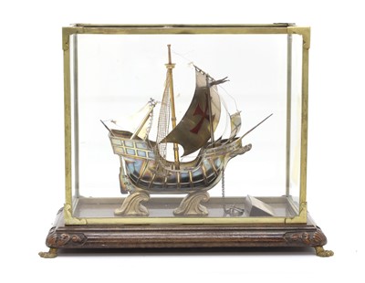 Lot 324 - A white metal model of the 'Nao Victoria' in a display case