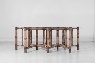 Lot 103 - A bamboo and glass dining table