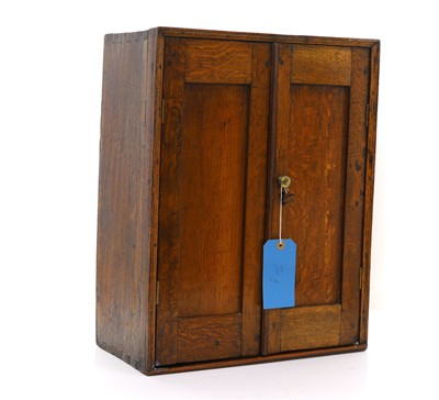 Lot 536 - A small oak table cabinet
