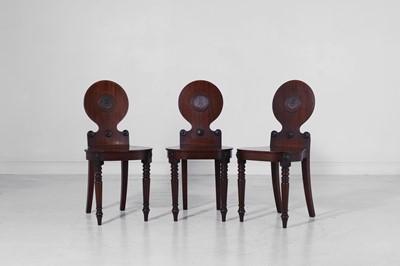 Lot 61 - A set of three Regency mahogany hall chairs