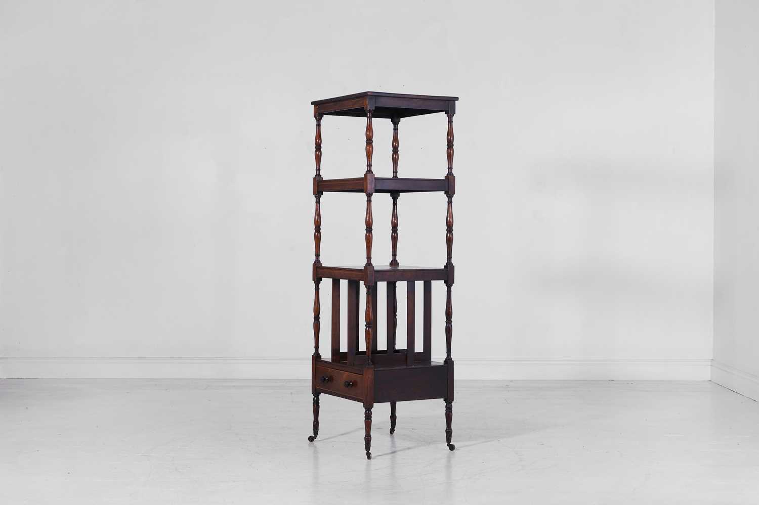 Lot 268 - A Regency simulated rosewood whatnot