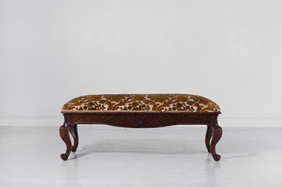 Lot 182 - A Victorian carved walnut ottoman