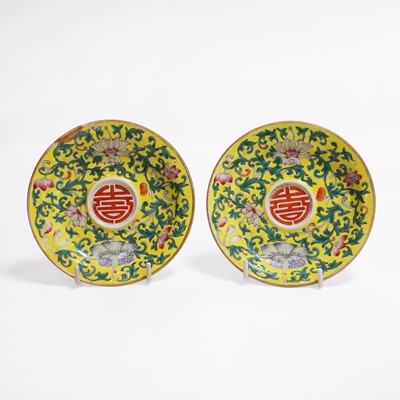 Lot 162 - A pair of Chinese famille jaune cup stands