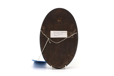 Lot 104 - A painted porcelain plaque