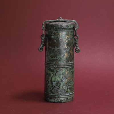 Lot 134 - A Chinese archaic gold-inlaid bronze zun vessel and cover