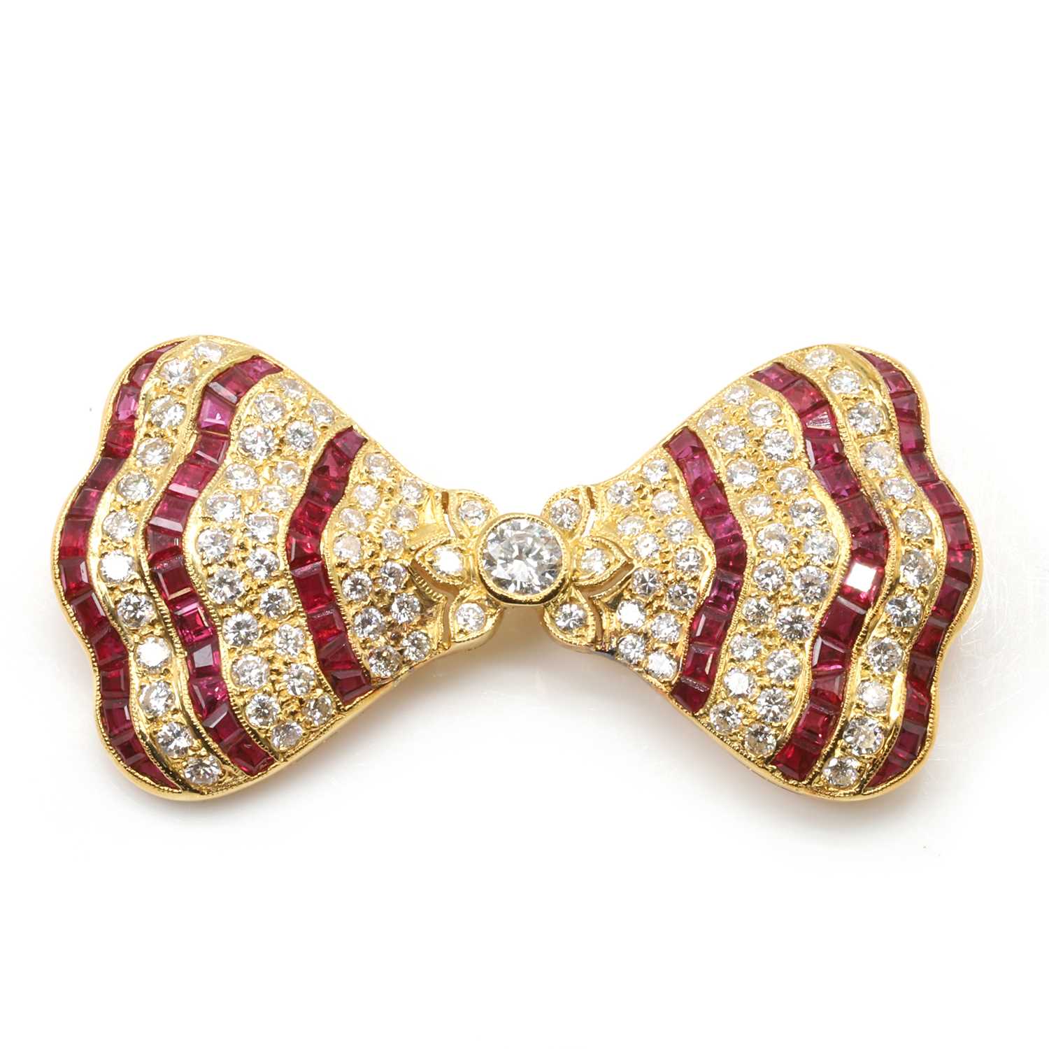Lot 66 - A ruby and diamond bow brooch