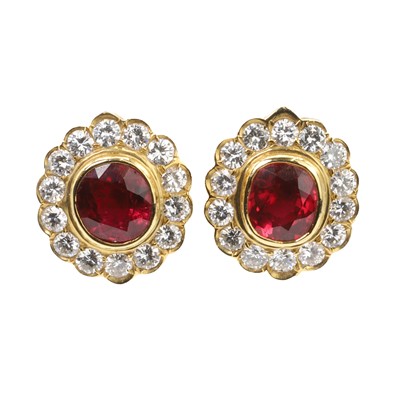 Lot 193 - A pair of ruby and diamond stud earrings