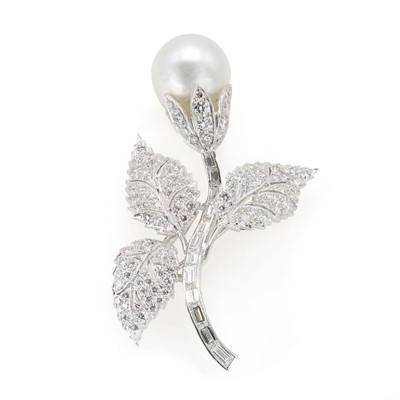 Lot 136 - A cultured pearl and diamond floral brooch