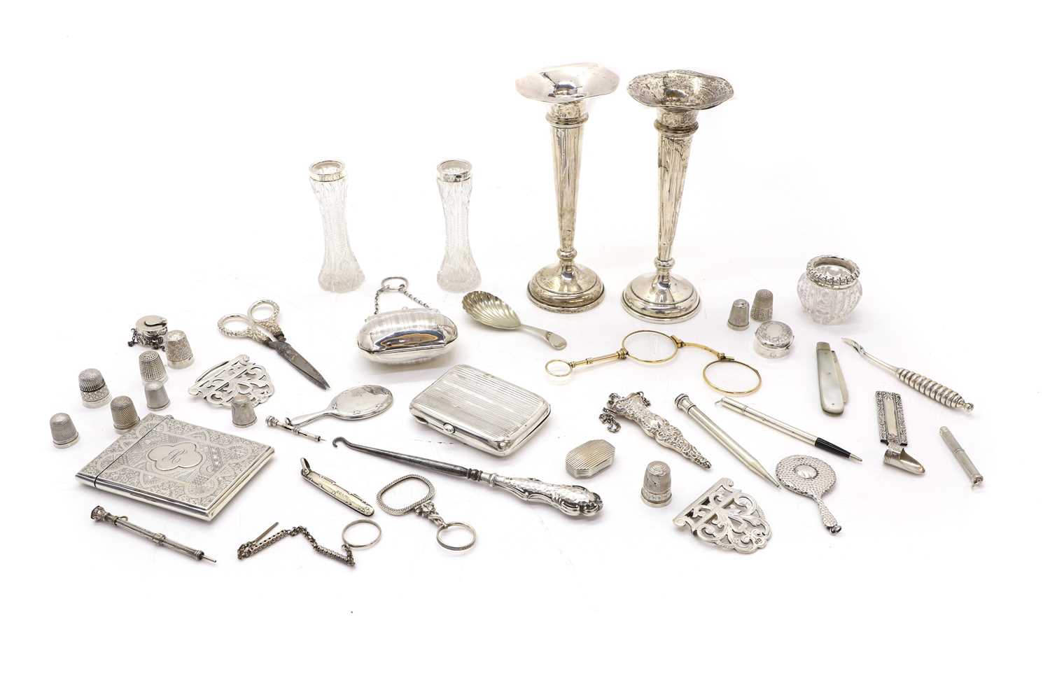 Lot 17 - A collection of silver novelty items