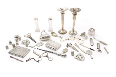 Lot 17 - A collection of silver novelty items