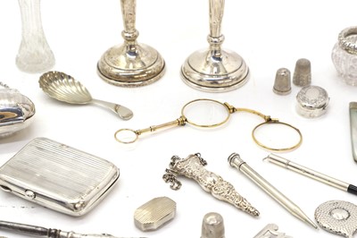 Lot 17 - A collection of silver novelty items