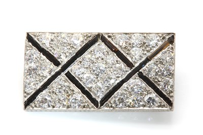 Lot 53 - An Art Deco onyx and diamond plaque brooch