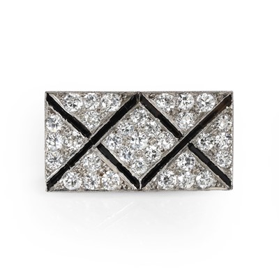 Lot 53 - An Art Deco onyx and diamond plaque brooch