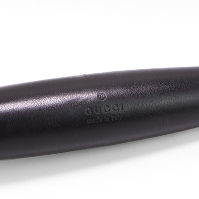 Lot 1336 - A set of Gucci and Hermès gardening tools