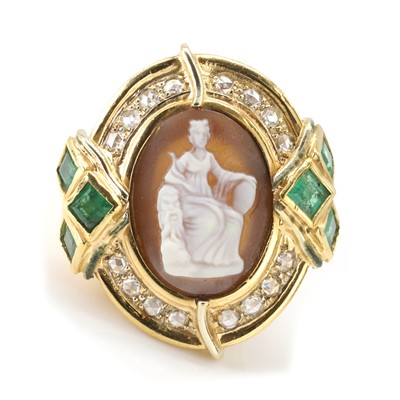 Lot 146 - A gold, shell cameo, emerald and diamond ring, by Angela Puttini