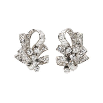 Lot 59 - A pair of diamond clip-on earrings, c.1950